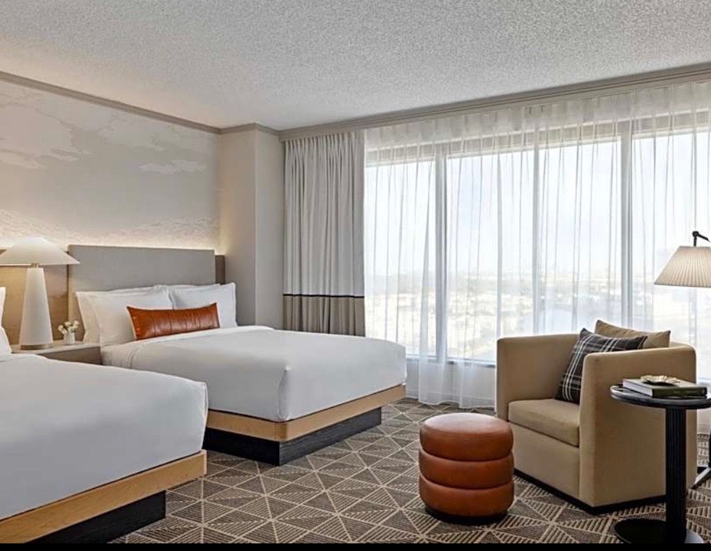 Contemporary hotel guest room with two beds